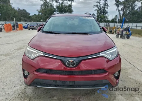2018 Toyota Rav4 Limited from USA, damaged, VIN 2T3YFREV9JW448972